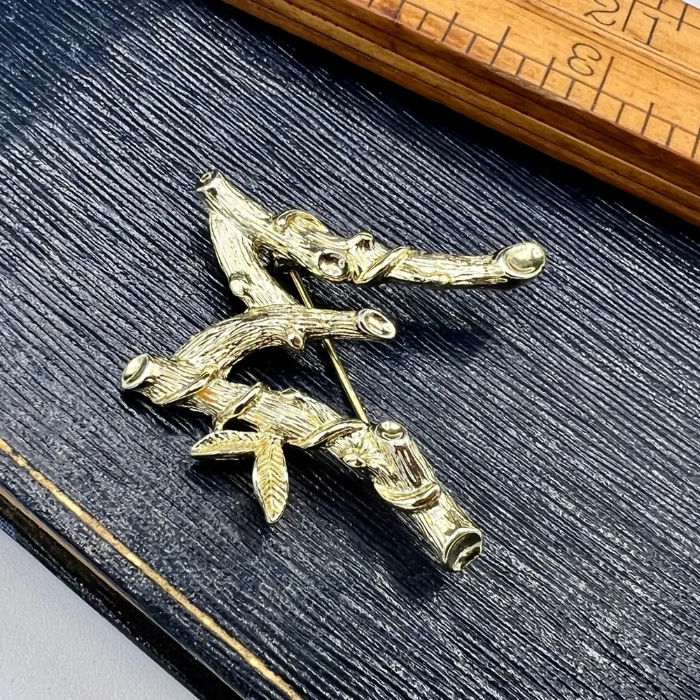 Vintage letter M initial brooch SARAH COVENTRY light gold tree branch stylized